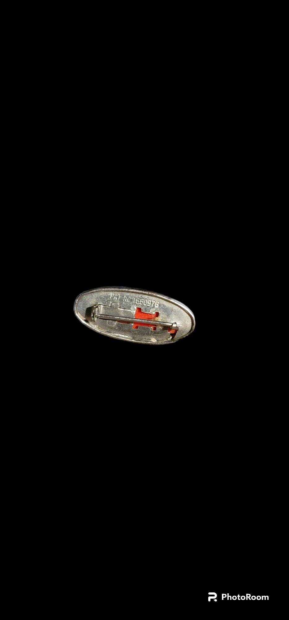 Red lapel pin