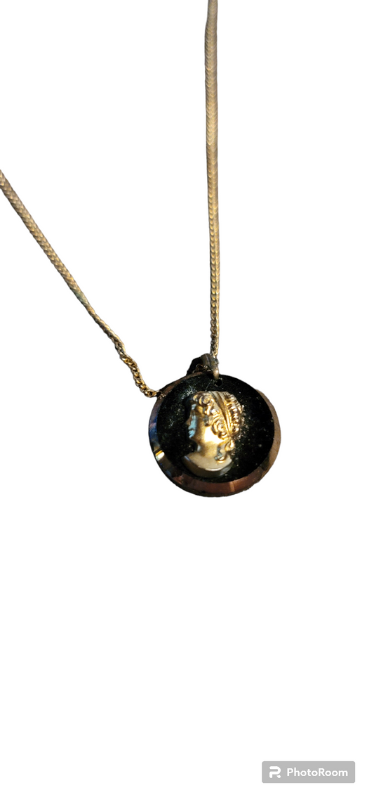Gold cameo necklace
