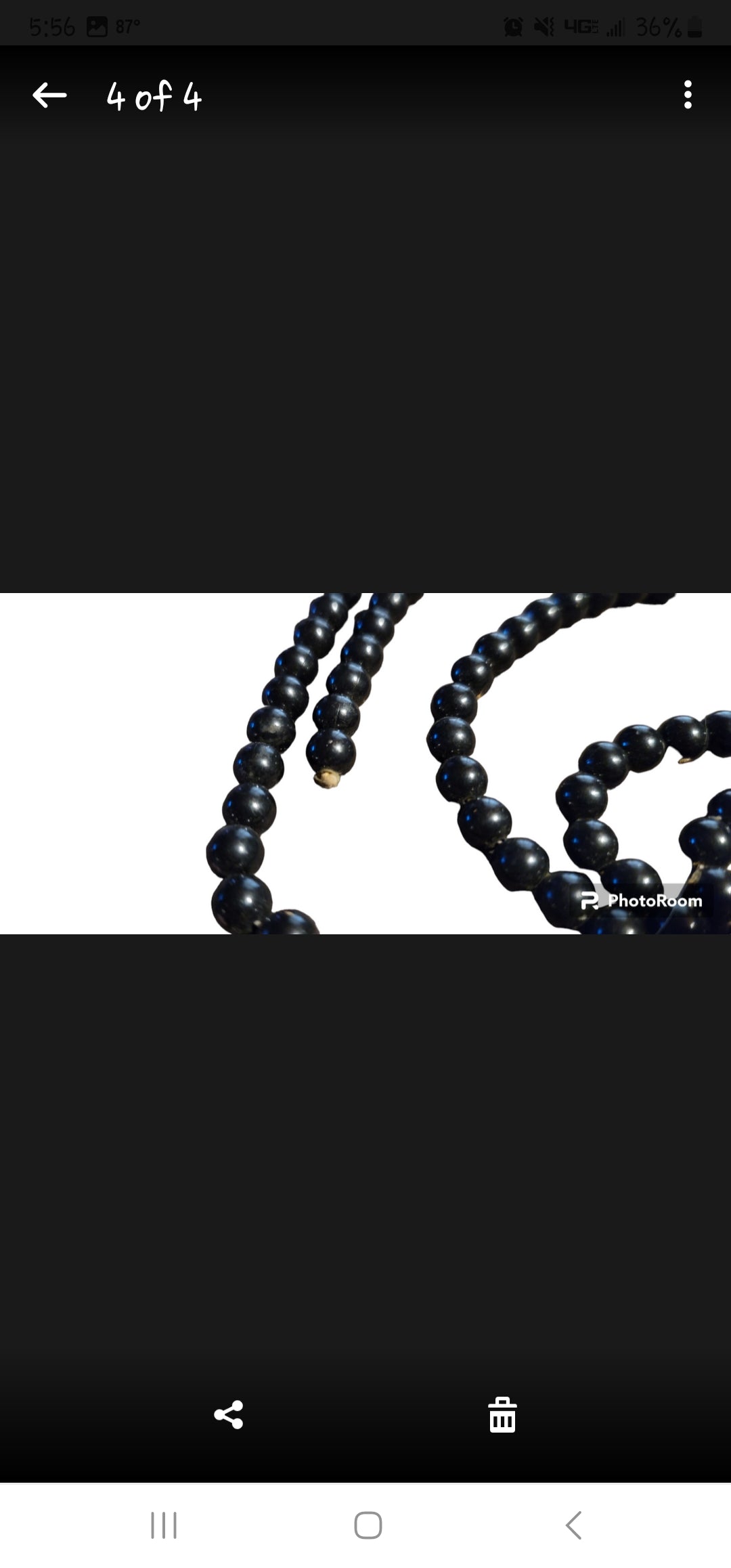 Long strand black faux pearls