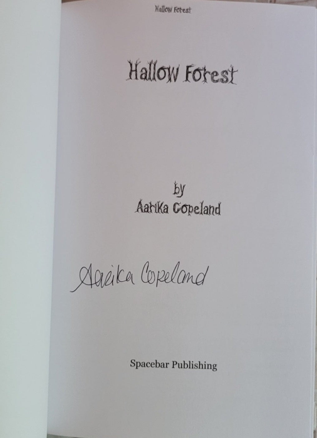 Signed "Hallow Forest" paperback