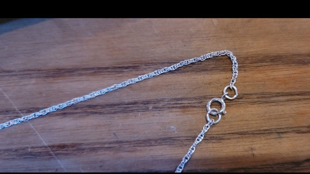 Unique resin pendant in silver setting