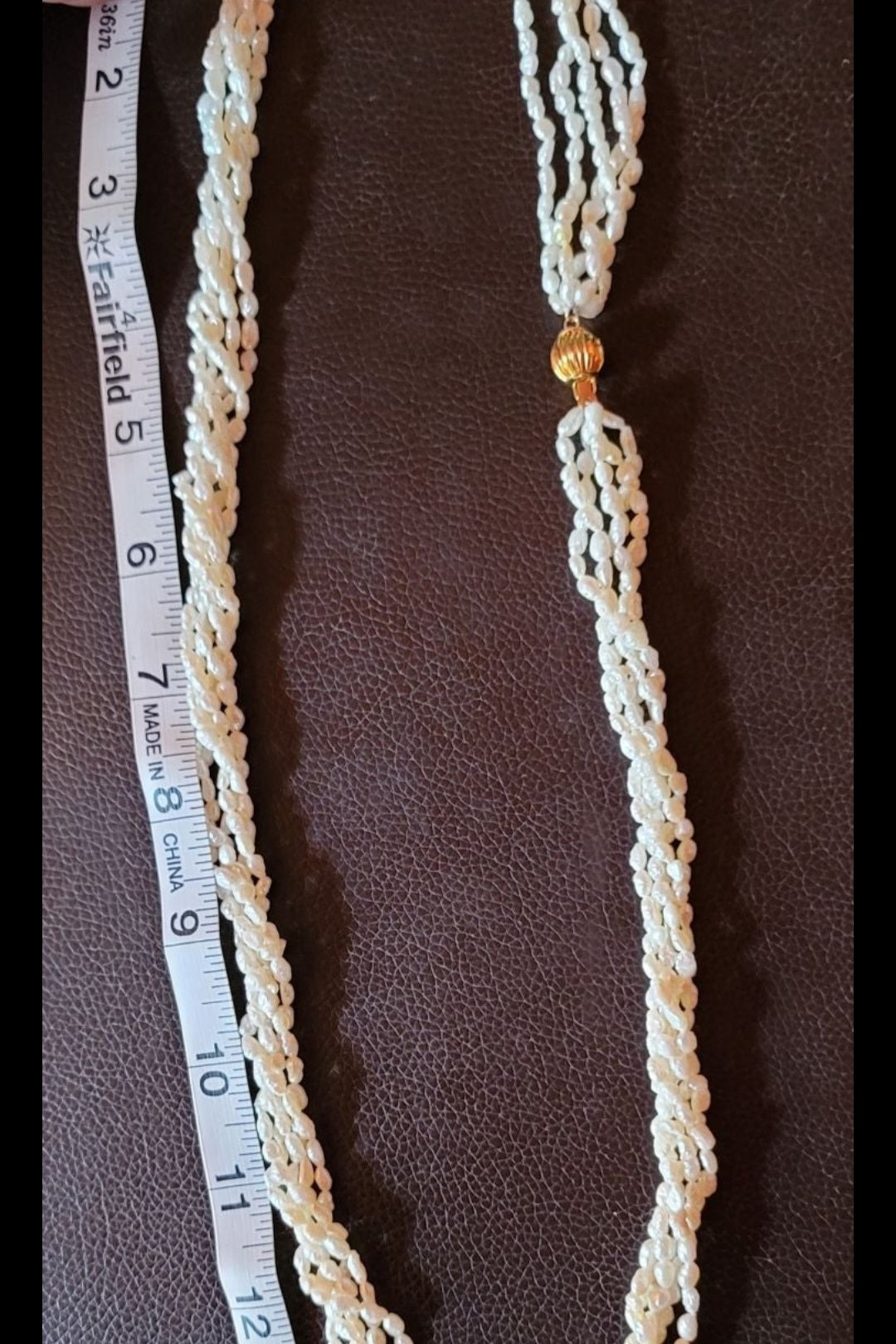 Multi strand faux pearl necklace