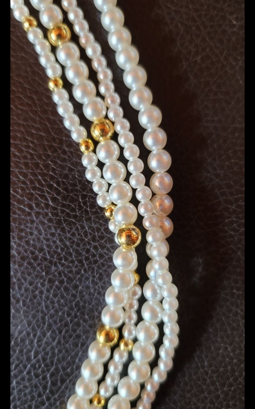 Multi strand faux pearl necklace