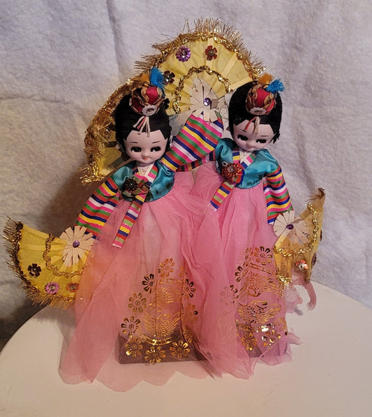Twin Asian cloth dolls