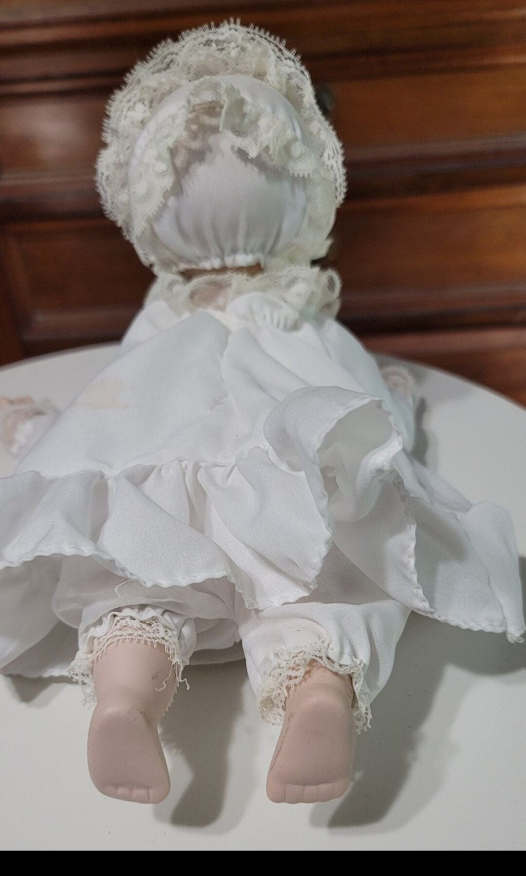 9 inch long porcelain baby doll